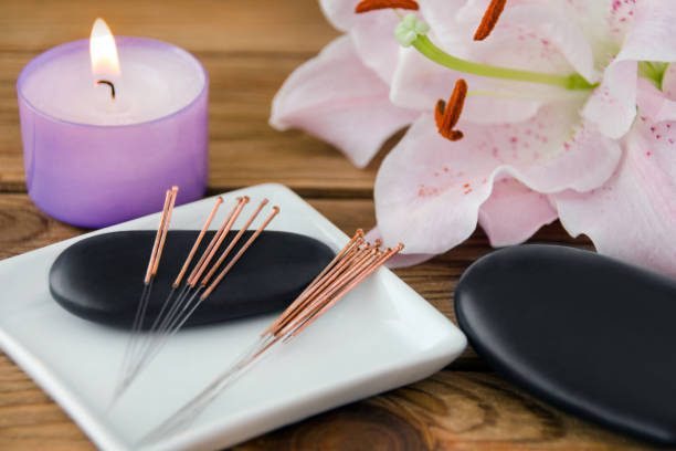 Acupuncture and Hot Stone Massage background